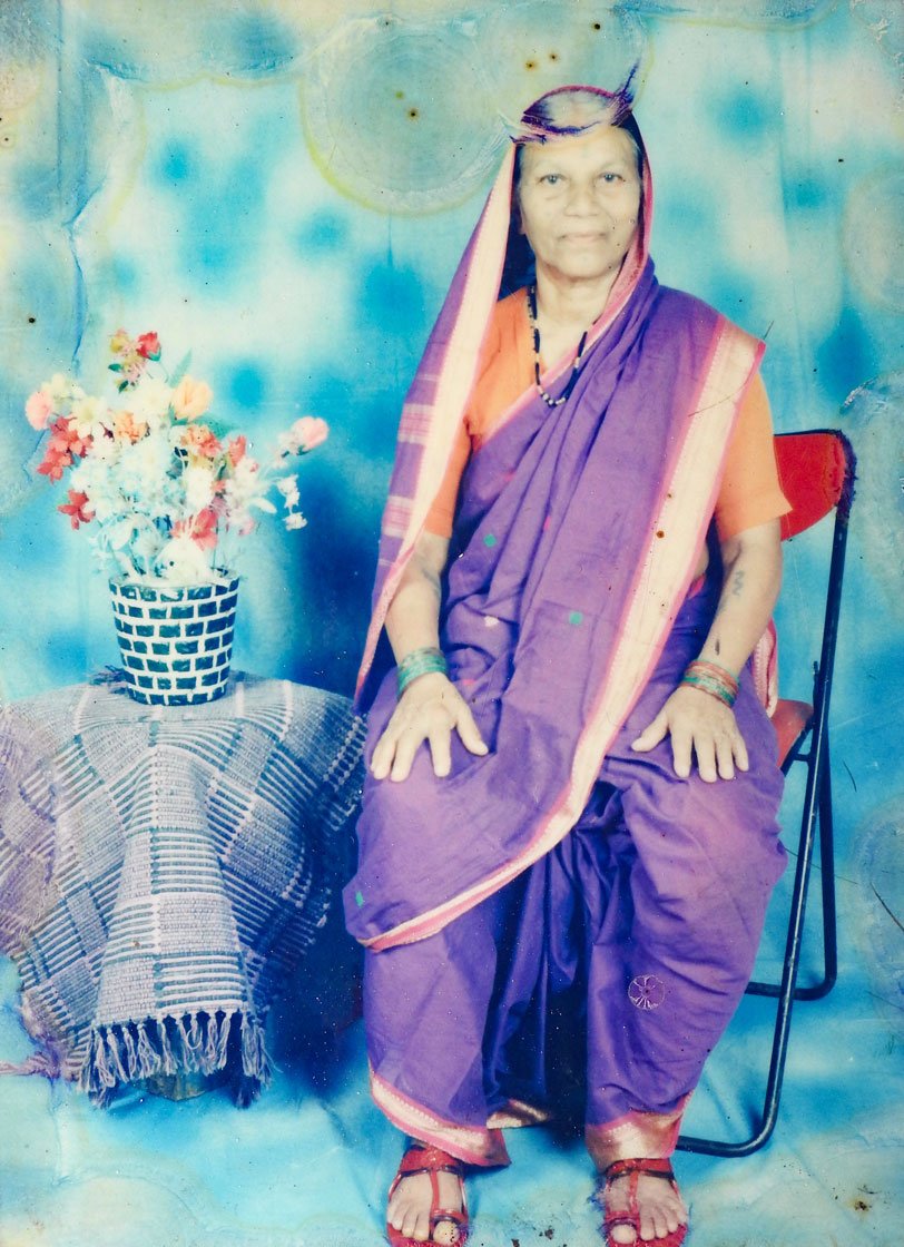 The late Jai Sakhale (left) and her daughter, Lilabai Shinde, with her mother's photo 

