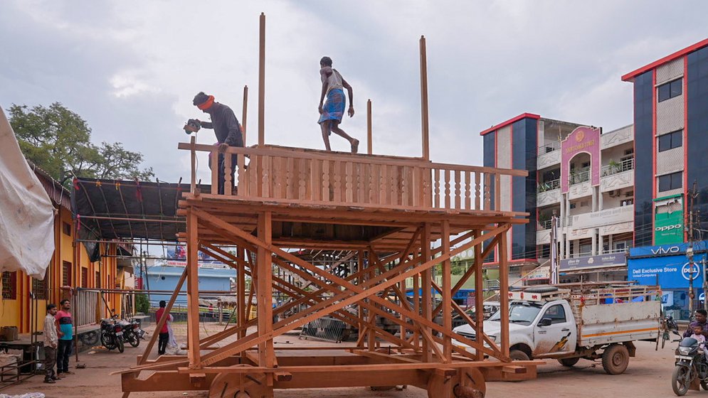 Craftsmen working on building a new rath (chariot) in Jagdalpur town. Raths are made using sal and teak wood.