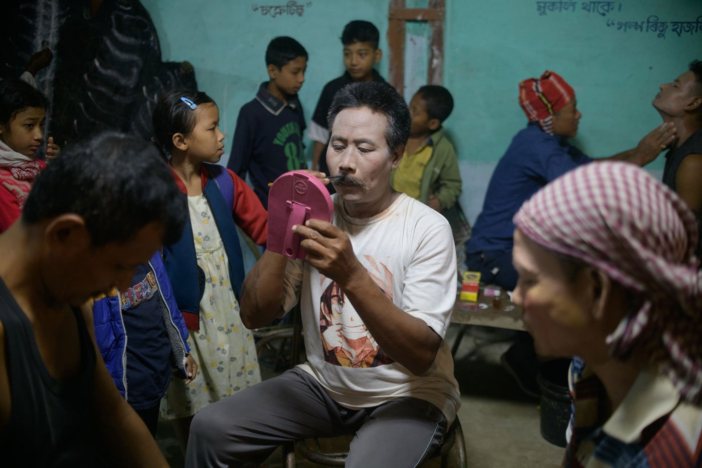 Apurbo Kaman (centre) pepares for his performance. He has been performing the role of Kansa at the Borun Chitadar Chuk festival for several years now