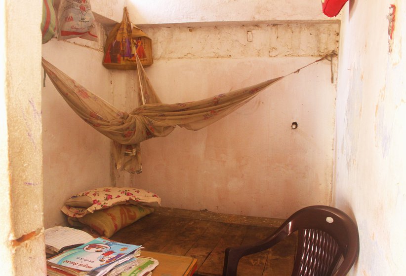 Left: The mosquito net and bedding in the office where ANMs sleep. Right: A broken bed in the post-natal care ward is used for storing junk