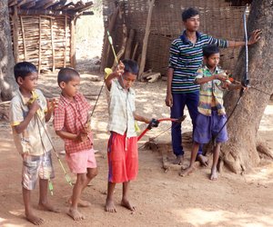 Kids holding archers 