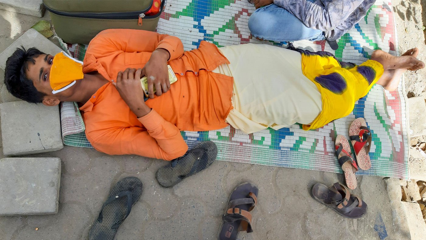 The footpath near the hospital has been home to Surendra. His check-up done, he can longer go back home to Potilia village in Bihar as trains were suspended for the 21-day nationwide lockdown from March 25. And he cannot afford to rent a room in Mumbai 

