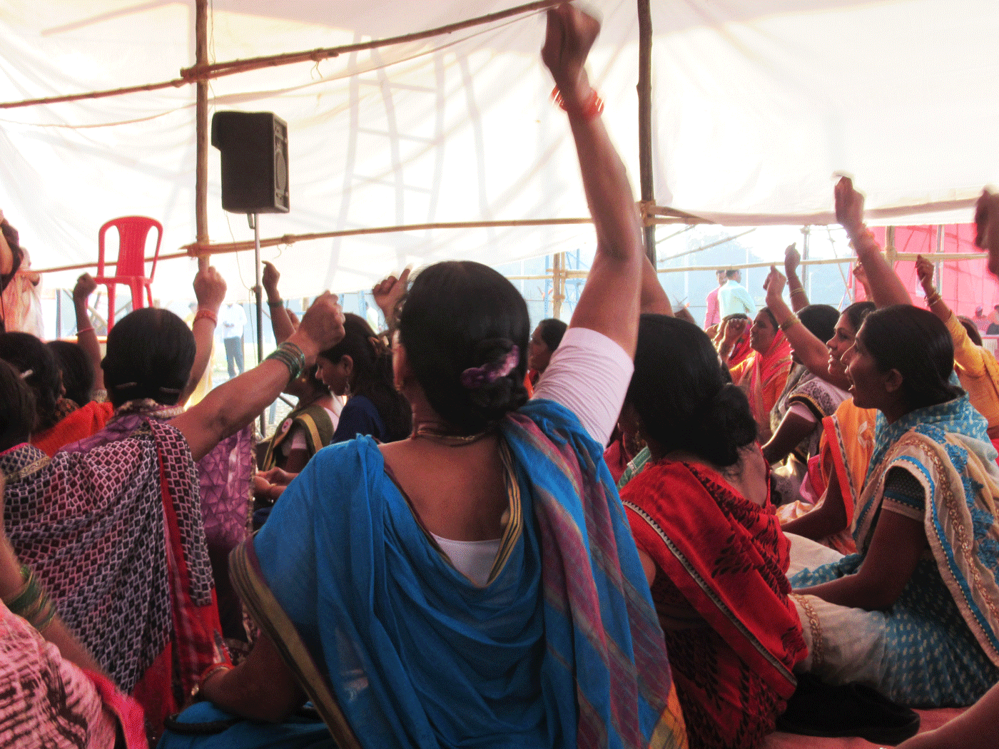 Women raising their fists in protest