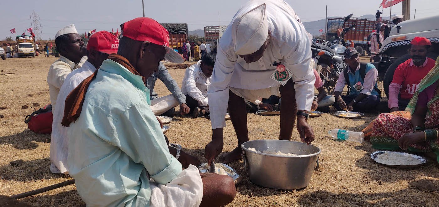 Farmer giving food