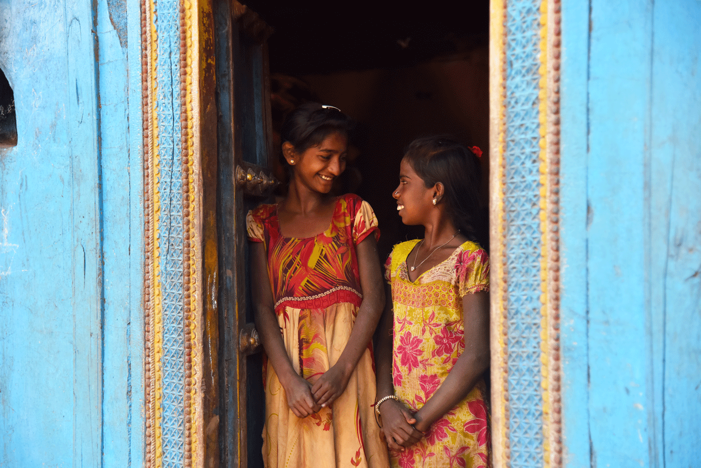 Two girls interacting with each other  