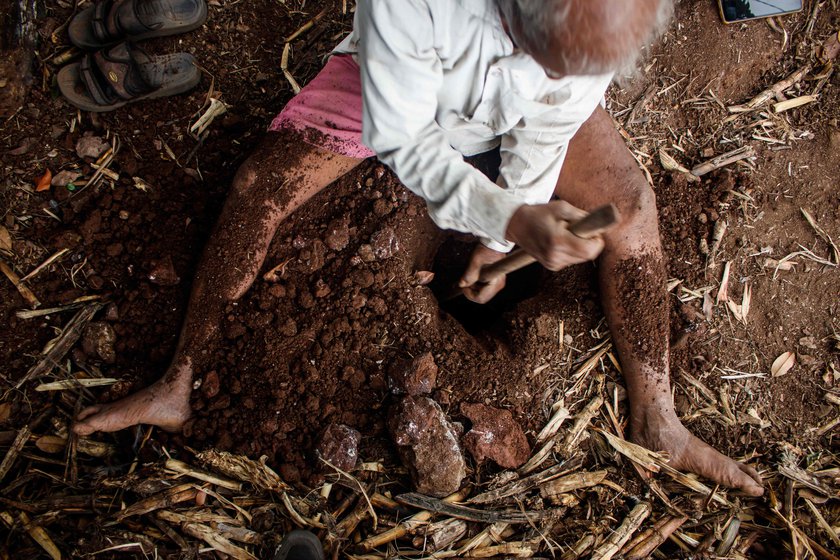 Left: Narayan digging two-feet holes to mount the base of the jhopdi.