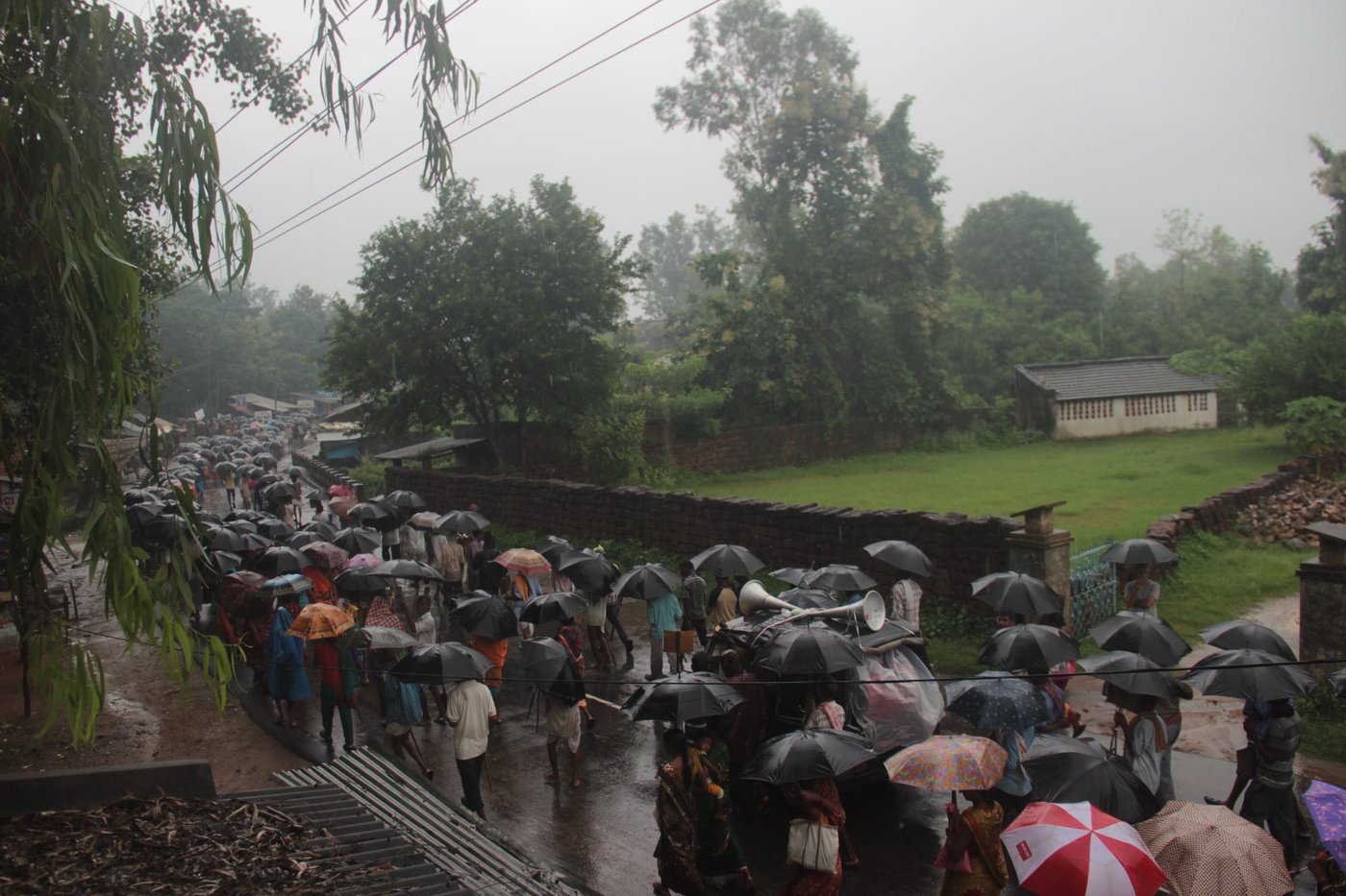 villagers going out protesting