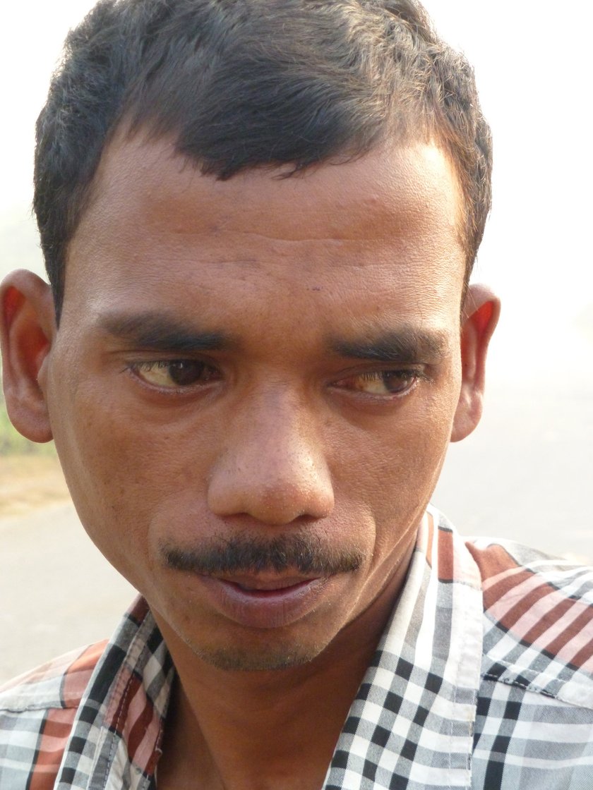 Less than a fourth of the total length sticks out at the front of the cycle. The huge, main body protrudes from the back of the cycle. We still couldn’t figure out how and why the rear end did not touch the ground. Biswas smiled patiently at our wonder