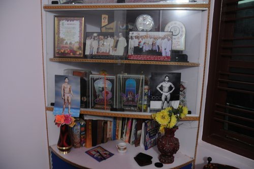 /static/media/uploads/Articles/P. Sainath/Wrestling /pujari's_trophy_case_at_home_dsc_1047.jpg