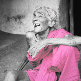 Old woman freedom fighter outside her home